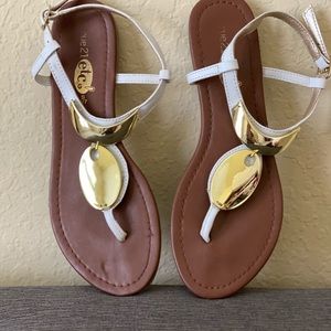 Gold and sandals. Size 6.